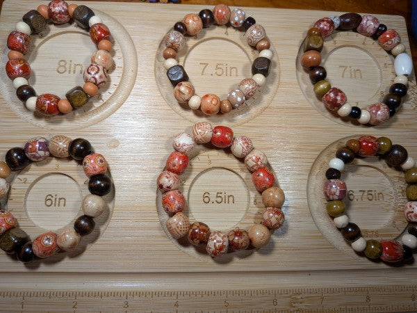 Wood/brown bead bracelets.